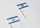 israel miniature flag on white surface