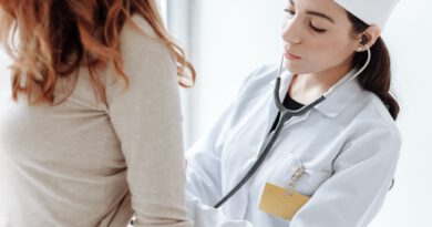 photo of doctor checking on her patient