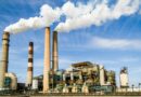 photo of an industrial factory emitting smoke