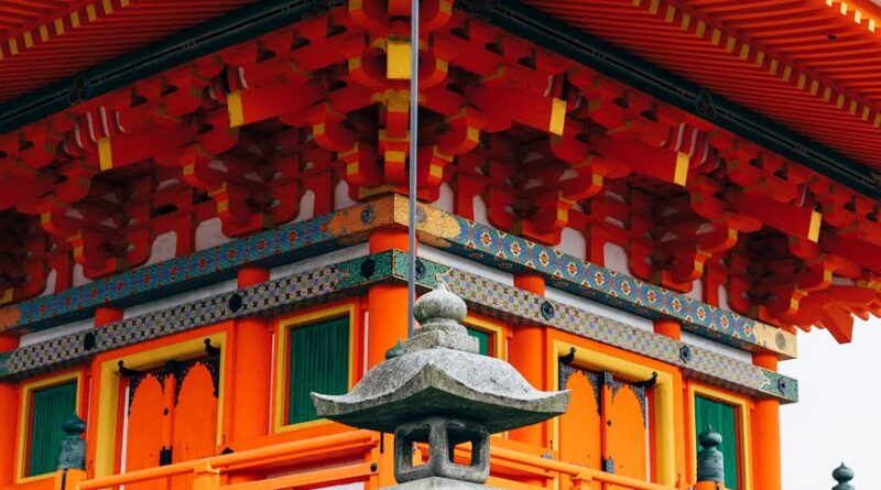 a pagoda with orange and green decorations